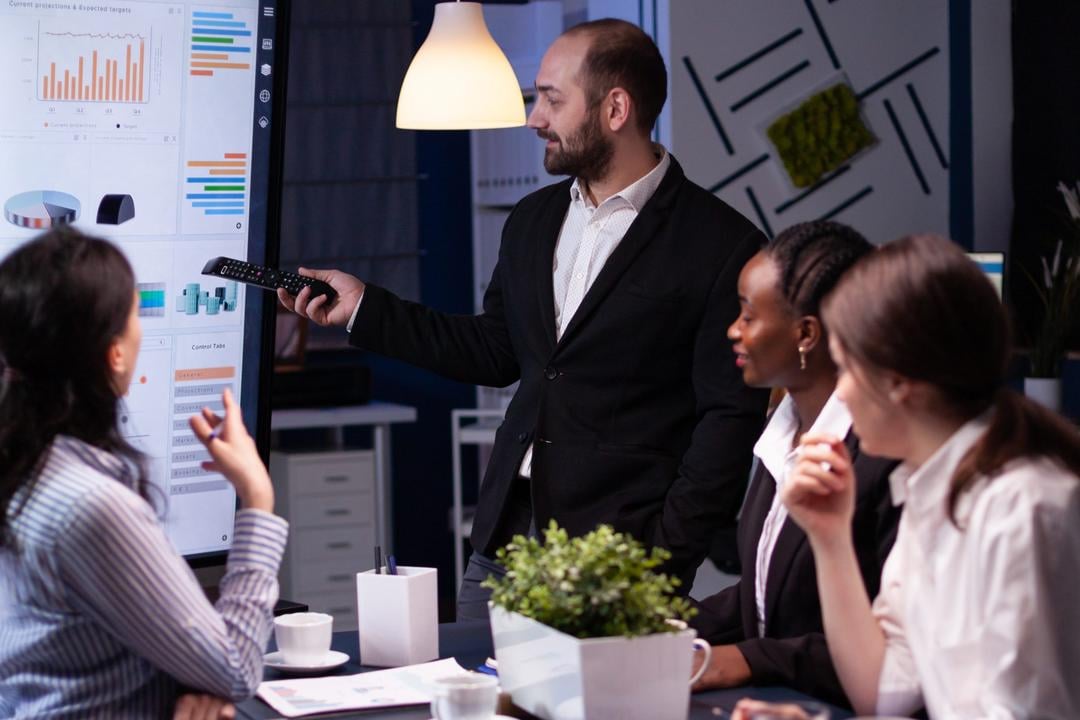 Modern 42 team in a government strategy meeting